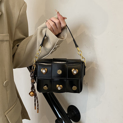 Handtasche mit Steinen
